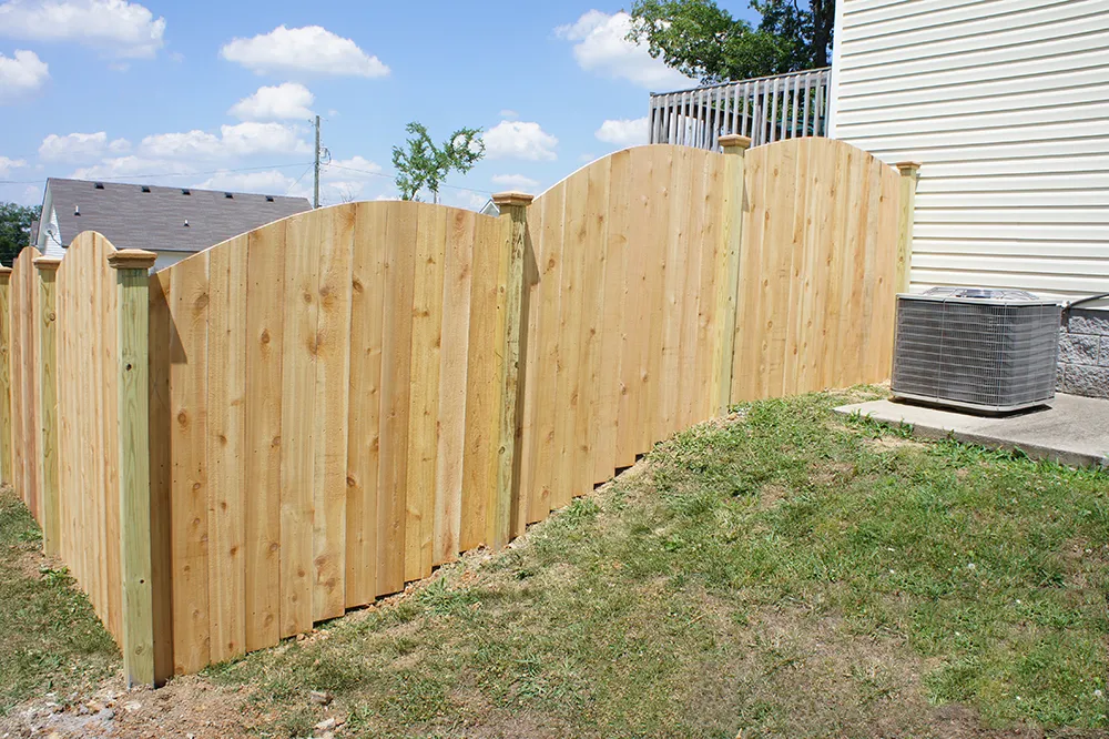 Arched Top Fence With Exposed Post And New England Caps